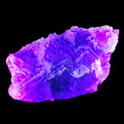 Fluorite snow steppes 137*55*65mm 1080g in UV light - Rocks and Things Store