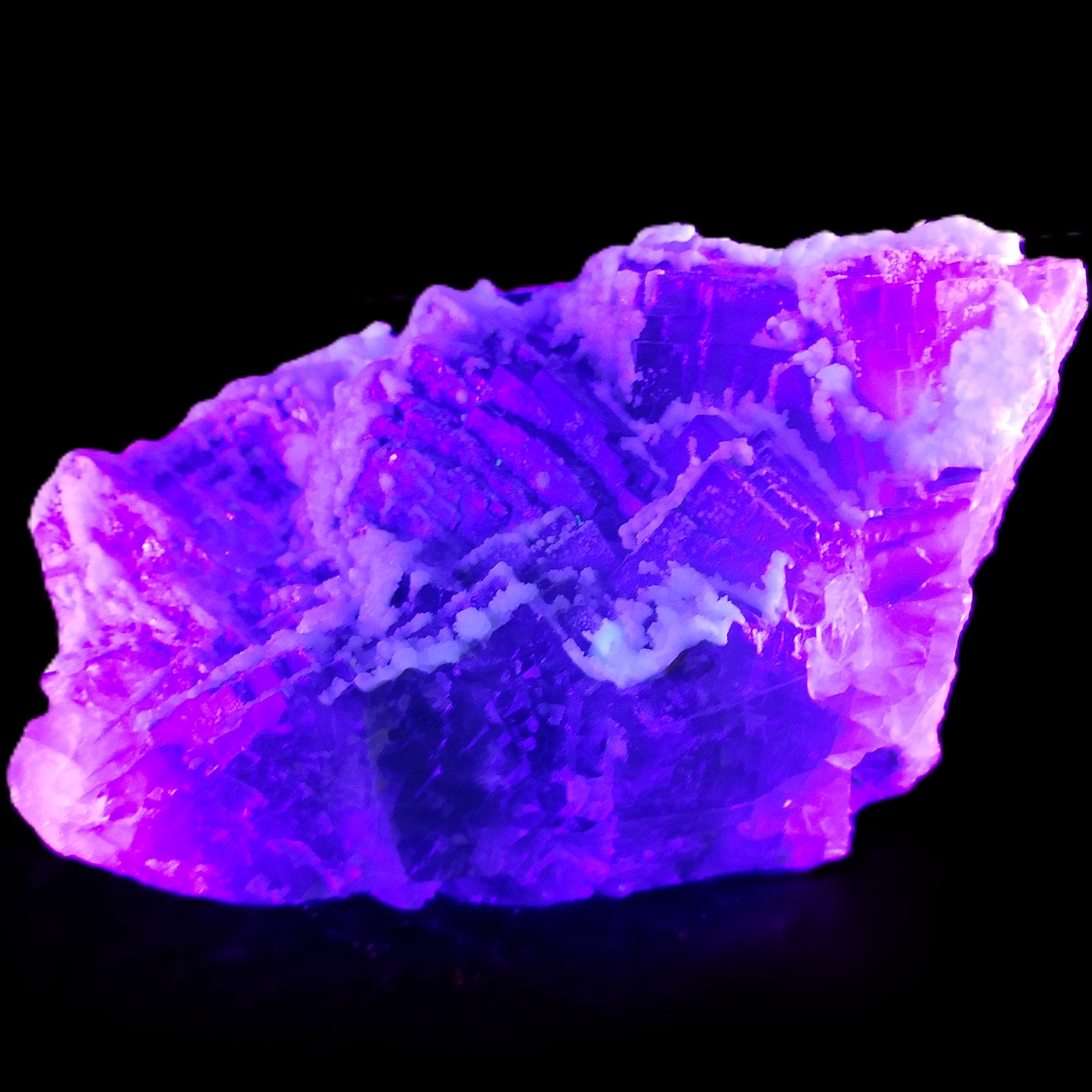 Fluorite snow steppes 137*55*65mm 1080g in UV light - Rocks and Things Store