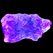 Fluorite snow steppes 137*55*65mm 1080g in UV light - Rocks and Things Store