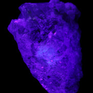 Green and Pink Tourmaline in Lepidolite, Feldspar and Quartz matrix 150*131*60mm 1204g in UV light - Rocks and Things Store