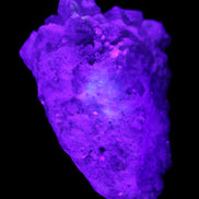 Green and Pink Tourmaline in Lepidolite, Feldspar and Quartz matrix 150*131*60mm 1204g in UV light - Rocks and Things Store