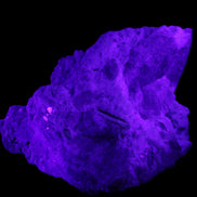 Green and Pink Tourmaline in Lepidolite, Feldspar and Quartz matrix 150*131*60mm 1204g in UV light - Rocks and Things Store