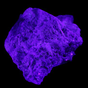 Green and Pink Tourmaline in Lepidolite, Feldspar and Quartz matrix 150*131*60mm 1204g in UV light - Rocks and Things Store