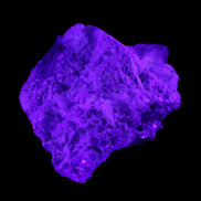 Green and Pink Tourmaline in Lepidolite, Feldspar and Quartz matrix 150*131*60mm 1204g in UV light - Rocks and Things Store