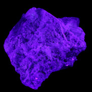 Green and Pink Tourmaline in Lepidolite, Feldspar and Quartz matrix 150*131*60mm 1204g in UV light - Rocks and Things Store