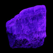 Awesome Blue Aragonite 100*83*71mm 1035g in UV light - Rocks and Things Store