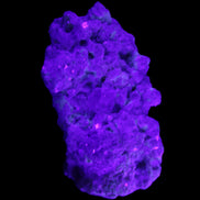 Clear Quartz, Green Tourmaline, Lepidolite and Feldspar 83*47*40mm 179g in UV light - Rocks and Things Store