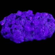 Clear Quartz, Green Tourmaline, Lepidolite and Feldspar 83*47*40mm 179g in UV light - Rocks and Things Store