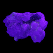 Green Tourmaline on Elestial Quartz 47*30*28mm 48g in UV light - Rocks and Things Store