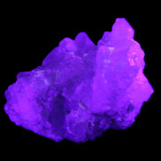 Green Tourmaline on Elestial Quartz 47*30*28mm 48g in UV light - Rocks and Things Store