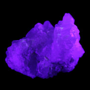 Green Tourmaline on Elestial Quartz 47*30*28mm 48g in UV light - Rocks and Things Store