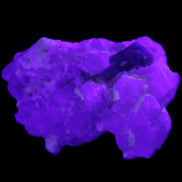 Green Tourmaline on Elestial Quartz 47*30*28mm 48g in UV light - Rocks and Things Store