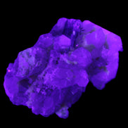 Green Tourmaline on Elestial Quartz 47*30*28mm 48g in UV light - Rocks and Things Store