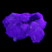 Green Tourmaline on Elestial Quartz 47*30*28mm 48g in UV light - Rocks and Things Store