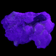 Green Tourmaline on Elestial Quartz 47*30*28mm 48g in UV light - Rocks and Things Store