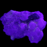 Green Tourmaline on Elestial Quartz 47*30*28mm 48g in UV light - Rocks and Things Store