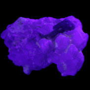 Green Tourmaline on Elestial Quartz 47*30*28mm 48g in UV light - Rocks and Things Store