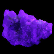 Green Tourmaline on Elestial Quartz 47*30*28mm 48g in UV light - Rocks and Things Store