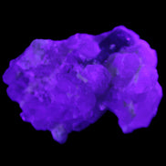 Green Tourmaline on Elestial Quartz 47*30*28mm 48g in UV light - Rocks and Things Store