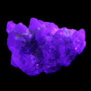 Green Tourmaline on Elestial Quartz 47*30*28mm 48g in UV light - Rocks and Things Store