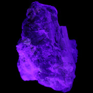 Elestial Smoky Quartz, Kunzite on Feldspar matrix 80mm 178g in UV light - Rocks and Things Store