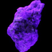 Green and Pink Tourmaline cluster on matrix 85*45*44mm 171g in UV light - Rocks and Things Store