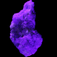 Green and Pink Tourmaline cluster on matrix 85*45*44mm 171g in UV light - Rocks and Things Store