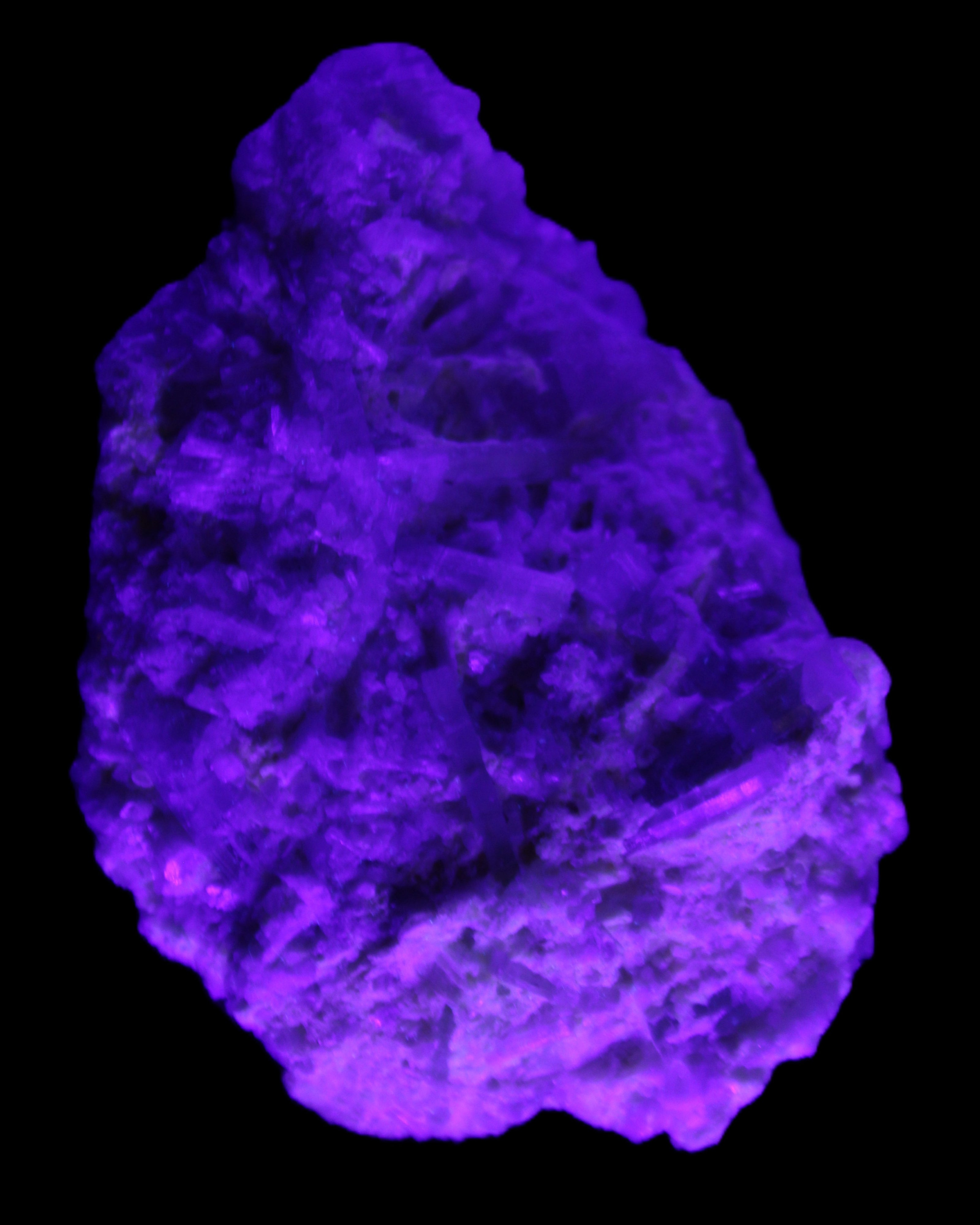 Green Tourmaline cluster on matrix 60*45*37mm 111.8g in UV light - Rocks and Things Store