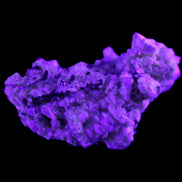 Green Tourmaline cluster on matrix 45*26*20mm 14.8g in UV light - Rocks and Things Store