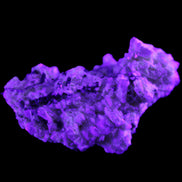 Green Tourmaline cluster on matrix 45*26*20mm 14.8g in UV light - Rocks and Things Store