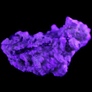 Green Tourmaline cluster on matrix 45*26*20mm 14.8g in UV light - Rocks and Things Store