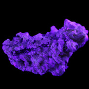 Green Tourmaline cluster on matrix 45*26*20mm 14.8g in UV light - Rocks and Things Store