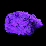 Green Tourmaline cluster on matrix 45*26*20mm 14.8g in UV light - Rocks and Things Store