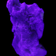 Green Tourmaline on Elestial Quartz 64*30*30mm 52g in UV light - Rocks and Things Store