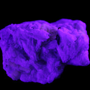 Apatite and hidden crystal on Mica and Feldspar matrix 47*38*24mm 51g in UV light - Rocks and Things Store