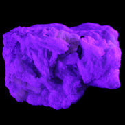 Apatite and hidden crystal on Mica and Feldspar matrix 47*38*24mm 51g in UV light - Rocks and Things Store