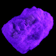 Apatite and hidden crystal on Mica and Feldspar matrix 47*38*24mm 51g in UV light - Rocks and Things Store