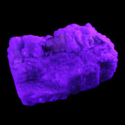 Apatite and hidden crystal on Mica and Feldspar matrix 47*38*24mm 51g in UV light - Rocks and Things Store