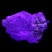 Green Tourmaline on Elestial Quartz 45*29*32mm 40.6g in UV light - Rocks and Things Store