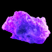 Pink and Clear Tourmaline in Lepidolite, Feldspar and Quartz matrix 90*45*50mm 188.7g in UV light - Rocks and Things Store