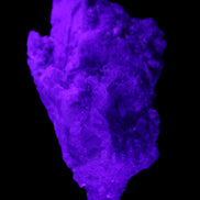 Pink and Clear Tourmaline in Lepidolite, Feldspar and Quartz matrix 90*45*50mm 188.7g in UV light - Rocks and Things Store