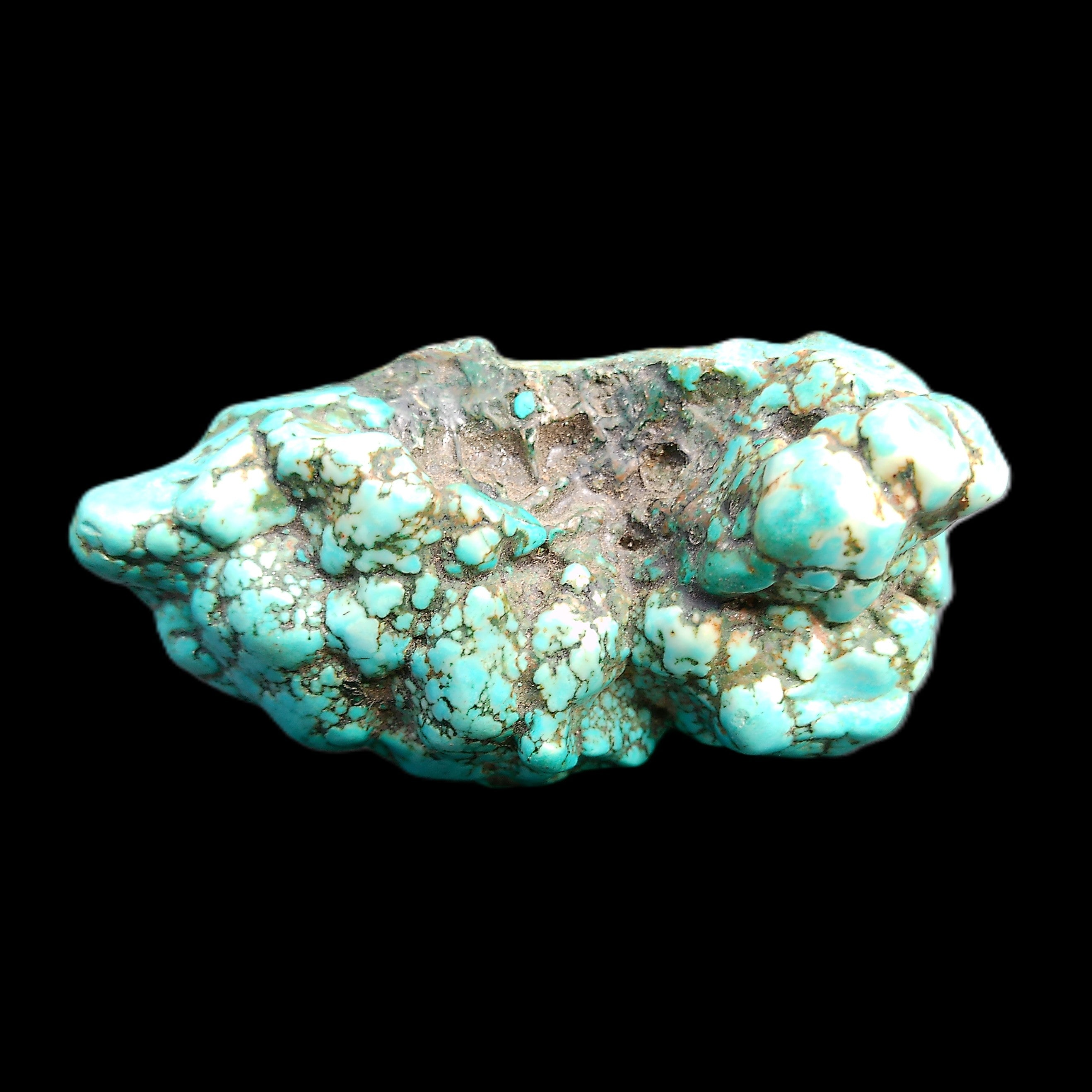 Persian Turquoise 75*55mm 134.5g in sunlight - Rocks and Things Store