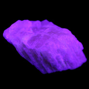 Pink Fluorescent White Calcite crystal 42*28*23mm 41g in UV light - Rocks and Things Store