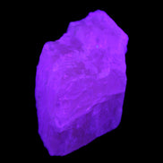 Pink Fluorescent White Calcite crystal 42*28*23mm 41g in UV light - Rocks and Things Store