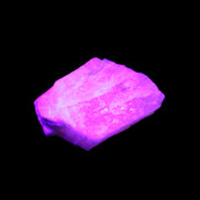 Pink Fluorescent White Calcite crystal 42*28*23mm 41g in UV light - Rocks and Things Store