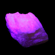 Pink Fluorescent White Calcite crystal 42*28*23mm 41g in UV light - Rocks and Things Store