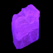Pink Fluorescent White Calcite crystal 42*28*23mm 41g in UV light - Rocks and Things Store