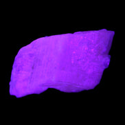 Pink Fluorescent White Calcite crystal 42*28*23mm 41g in UV light - Rocks and Things Store