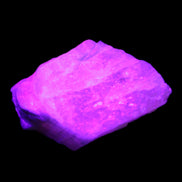 Pink Fluorescent White Calcite crystal 42*28*23mm 41g in UV light - Rocks and Things Store