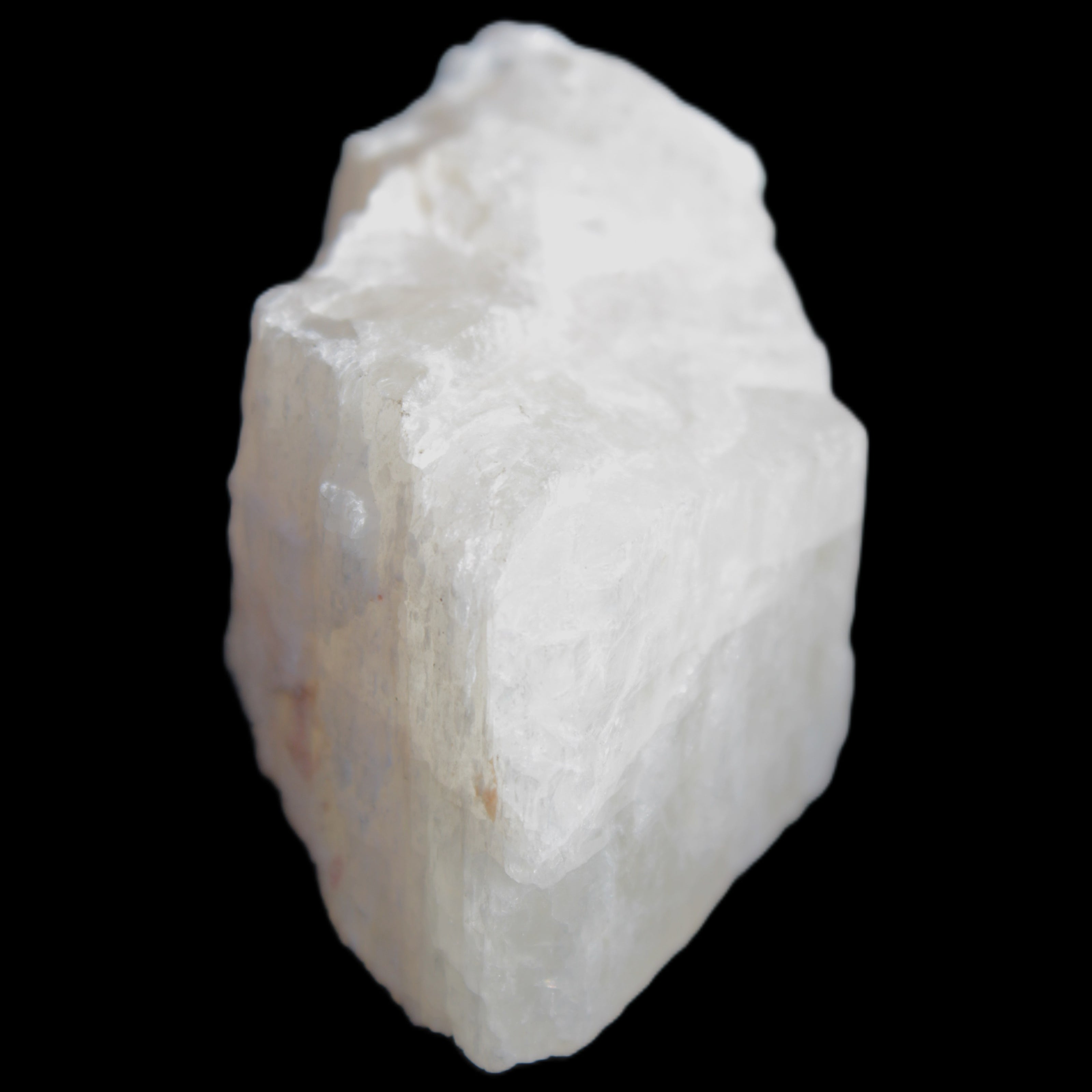 Pink Fluorescent White Calcite crystal 42*28*23mm 41g in sunlight - Rocks and Things Store